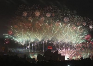 Fireworks explode in the sky above Sydney Harbour during the New Year ,2013