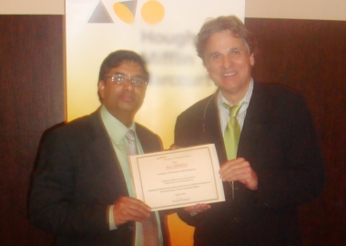 Receiving the certificate of attendance from  Dr. Michael Anthony DiSpezio